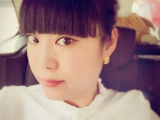 &一笑而過的主播照片