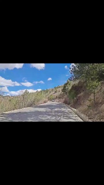 小江爬觉巴山